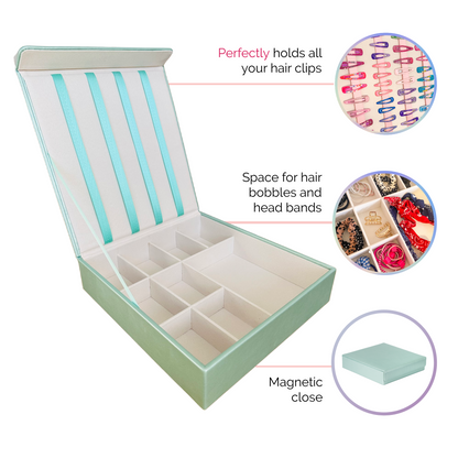 This is a graphic image which shows the mint green hair accessory organiser which is empty. It then has 3 inset images which show how the box is used. One image shows hair clips clipped onto the integrated ribbons in the lid, one shows hair bobbles and scrunchies stored neatly in the bottom section, and the last one shows the closed box