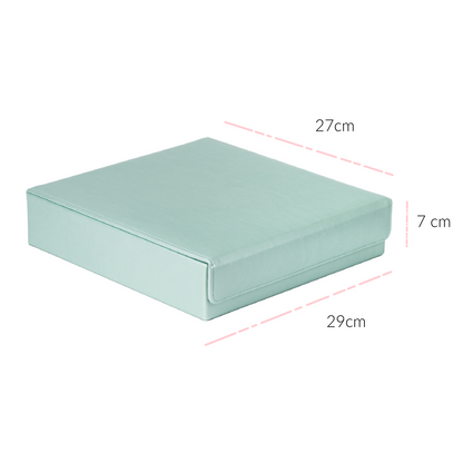 The mint green accessory organiser is shown closed against a white background. The magnetic closing flap at the front is visible. The measurements are shown on the image. The box, when closed, measures 29cm wide, 27 cm depth, and 7cm high